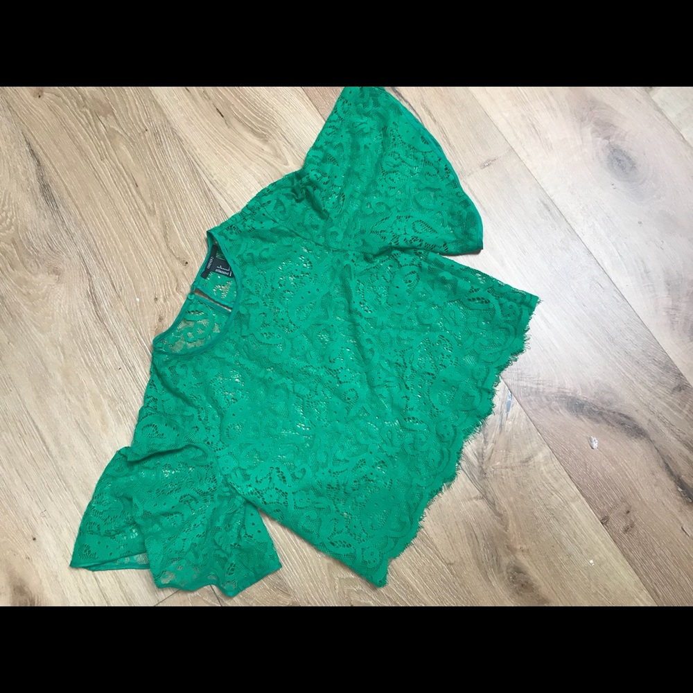 Cropped green lace belle sleeve top
